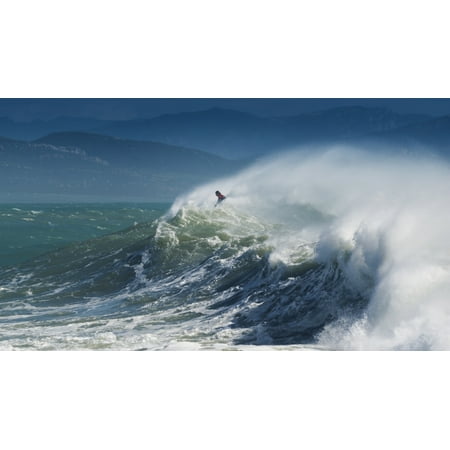 A Person Surfing In The Waves Along The Coast Of Cape Trafalgar Cadiz Andalusia Spain Stretched Canvas - Ben Welsh  Design Pics (20 x