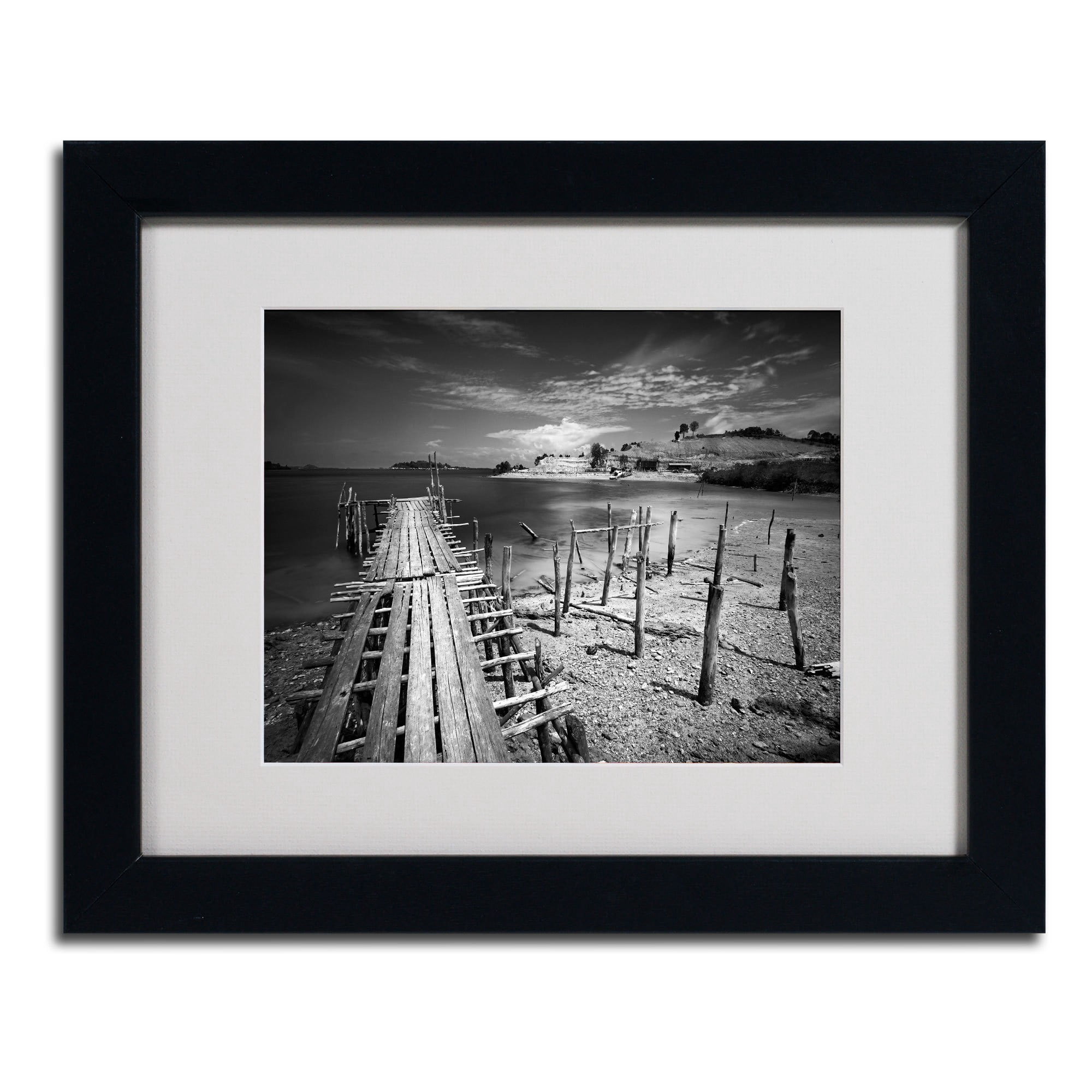 Matted art under acrylic in a black frame
