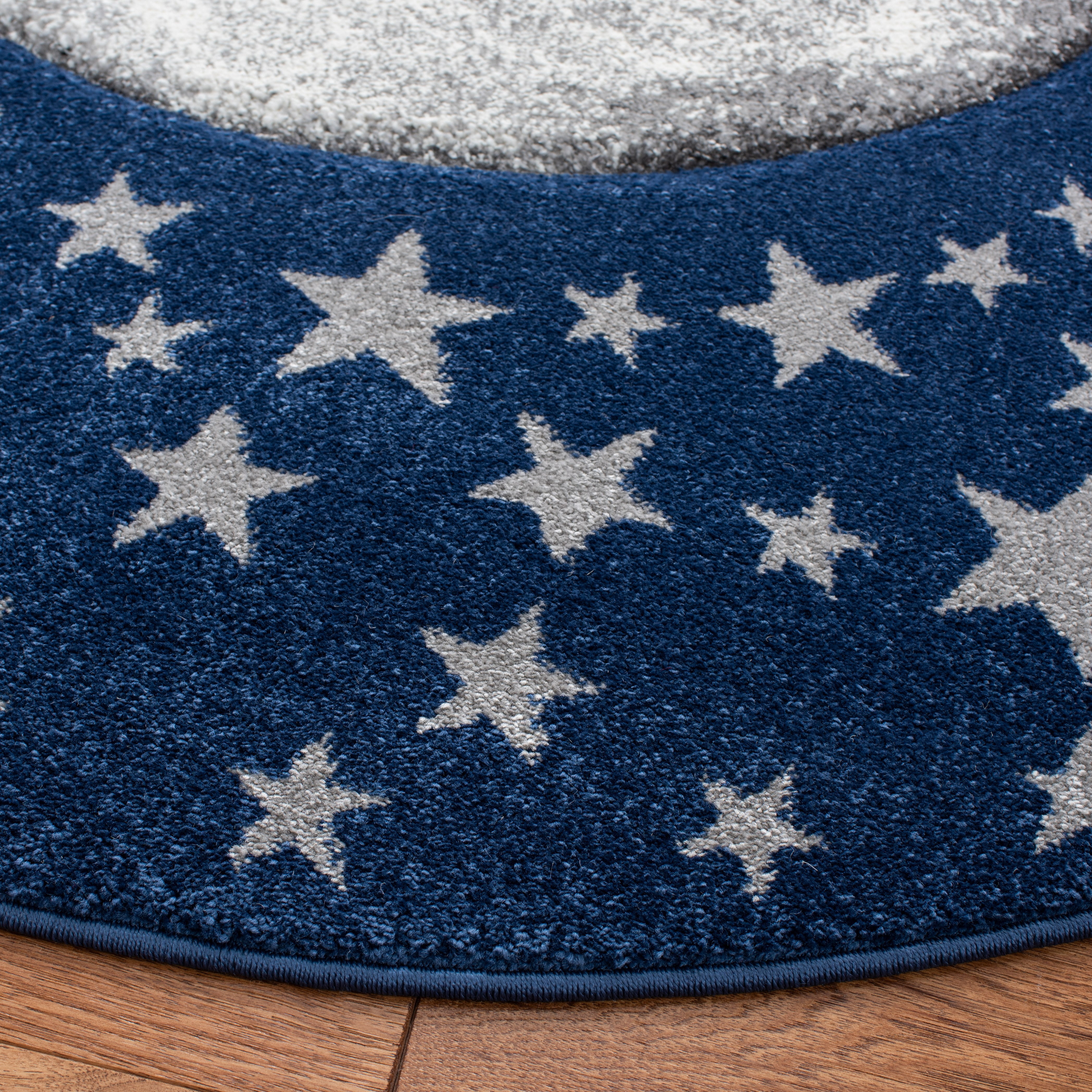 SAFAVIEH Carousel Kids Moon in the Stars Area Rug, Navy/Gray, 3' x 3' Round
