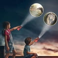 thumbnail image 1 of Proyector De Dibujos Animados Para Niños Linterna Juguete Luminoso Proyector De Dibujos Animados Para Niños Linterna Juguete Luminoso Lente Giratoria Proyector De Juguete Con 24 ANGGREK Juguetes, 1 of 8