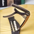 thumbnail image 2 of Metal Guitar Capo Aluminum Alloy Guitar Tuner Clamp Professional Key Trigger Capo for Acoustic Electric Musical Instruments Local gold, 2 of 6