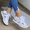 White, variant on Womens Breathable Slip-On Round Toe Sneakers - Durable Non-Slip Platform Shoes for Everyday Wear