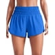 thumbnail image 1 of Shorts CRZ YOGA tiro alto con bolsillos laterales y cierre, azul, XS, 1 of 3