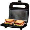 thumbnail image 1 of OVENTE - Parrilla eléctrica Panini con placas antiadherentes, luces indicadoras LED, control de termostato, mango de tacto fresco, sandwichera compacta perfecta para cocinar desayuno, aperitivos y más, 1 of 5