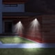 thumbnail image 4 of Cámara de vigilancia falsa, solar, sensor de movimiento, 3 modos, 46 cuentas de lámpara LED, luz inteligente con sensor de movimiento, luz blanca, 4 of 9