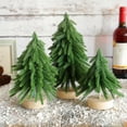 thumbnail image 1 of Xihbxyly Mini Árbol de Navidad, Decoración de Mesa Pequeña, Elegante Base de Madera, Alegría Navideña, Uso Versátil En Casa o En La Oficina, Material de Pvc, Opciones de Tamaño: 19/24/29 Cm, Juego de, 1 of 6