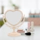 thumbnail image 5 of Espejo de maquillaje de mesa con aumento de doble cara y rotación de 360 grados (forma de corazón, beige), 5 of 8