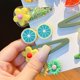 thumbnail image 4 of Juego de 14 horquillas con diseños de flores y frutas de colores para el cabello de niñas, inspirado en princesas y temática verde, 4 of 5