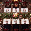 Holiday Table Mats A painting of a santa claus holding a box,6 Pack ...