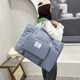 thumbnail image 1 of Bolsa de viaje grande, bolsa de gimnasio expandible, maleta de mano para mujer con funda para trolley y bolsillo impermeable, bolsa de lona de viaje., 1 of 7
