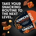 thumbnail image 4 of Oikos REMIX Salted Caramel 11g Protein, Caramel Fat Free Greek Yogurt Cup with Sea Salt Praline Pretzels, Dark Chocolate and Butter Toffee Mix-Ins, 4.5 oz, 4 of 12