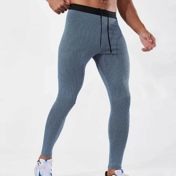 Pantalones de yoga largos para hombre, elásticos, de color liso, deportivos, con bolsillo y cordón, de poliéster.