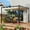 Cream White, variant on Outsunny 10' x 10' Retractable Pergola with Magnetic Fixture, UPF30+ Patio Pergola, Blue