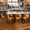 Brown, variant on Genpo Swivel Counter Height Bar Stools Set of 2, 24 inch White Leather Kitchen Swivel Counter Stools with Backs, Wood Legs and Footrest, Bar Chairs for Kitchen Island