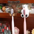 thumbnail image 4 of Estante de almacenamiento Soporte para cepillo de dientes de oso de dibujos animados Soporte para cepillo de dientes con ventosa de PVC creativo para el baño del hogar (3 piezas), 4 of 5