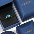 thumbnail image 5 of Gem Stone King 18K Yellow Gold Plated Silver Simulated Blue Opal and White Moissanite Engagement Ring for Women | 1.02 Cttw | Oval Cabochon 9X7MM | Gemstone October Birthstone | Size 8, 5 of 7