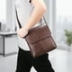 thumbnail image 1 of Bolso Bandolera de Piel Sintética Texturizada, con Correa Ajustable, Ligero y Espacioso, Ideal para Viajes, Trabajo y Uso Diario | Múltiples Compartimentos para Organizar Tu Espacio | Negro y Marrón, 1 of 6