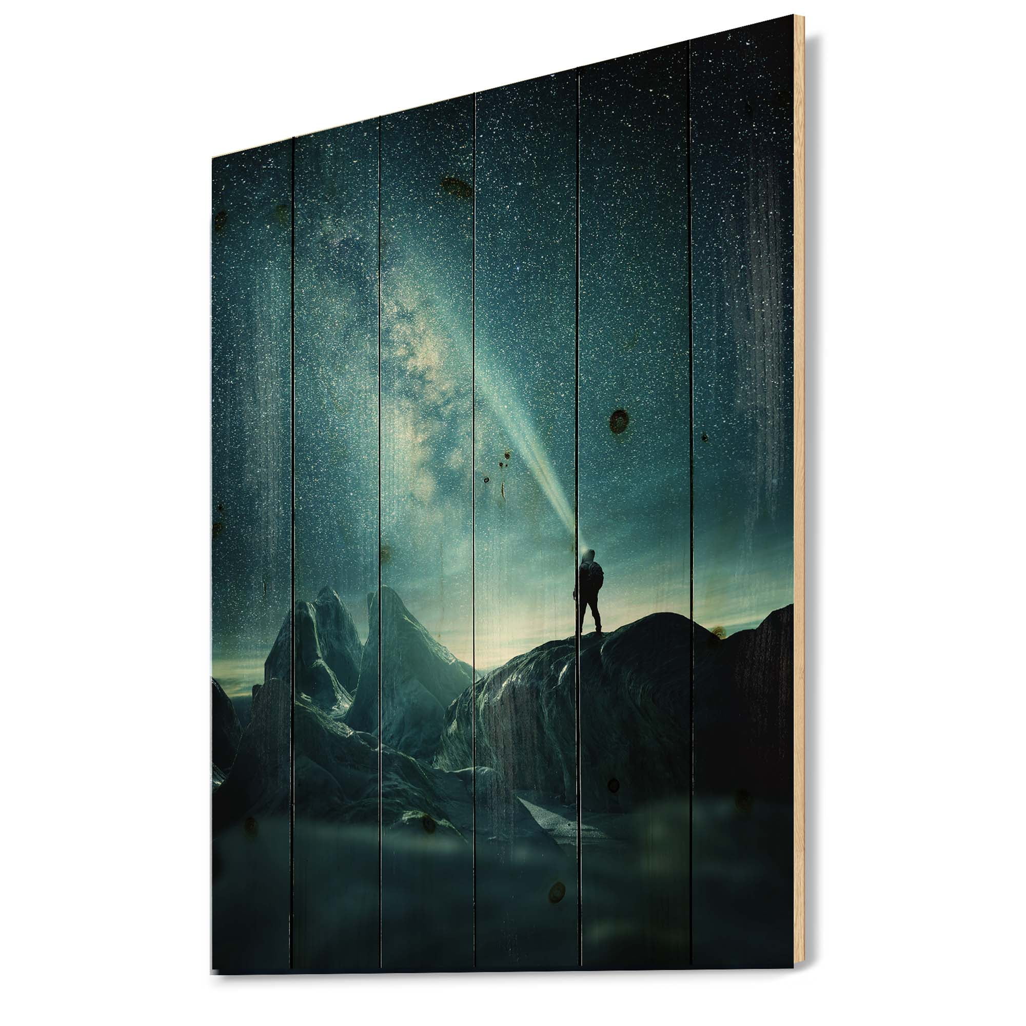 Designart 'A Light Shining by A Man Shining Into The Night Sky' Modern Print on Natural Pine Wood