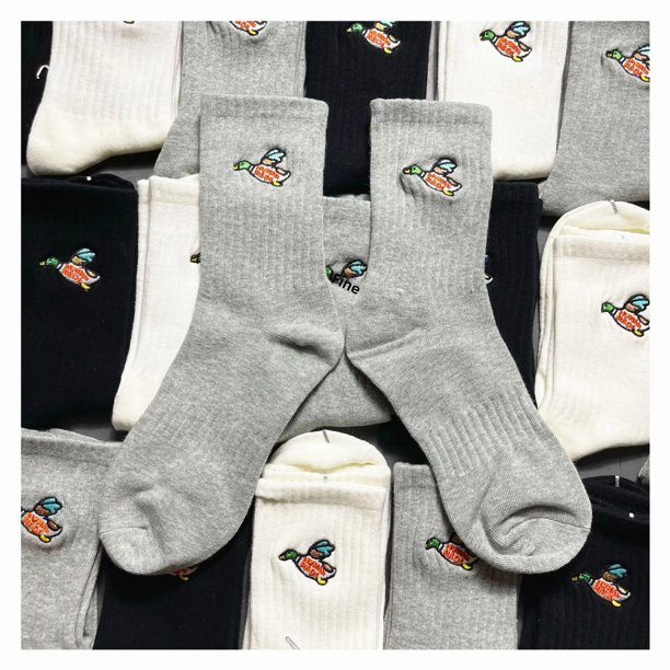 Calcetines bordados de pato volador MD humano de marca japonesa a la moda calcetines de algodón de tubo medio alto para hombres y mujeres deportes callejeros Du