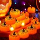 thumbnail image 1 of - Paquete de 12 luces de té de calabaza parpadeantes con calabazas LED parpadeantes para fiestas de Halloween (tela de araña), 1 of 5