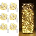 thumbnail image 1 of Paquete de 6 luces de hadas que funcionan con pilas, 20 luces LED de 7 pies, luces centelleantes de alambre plate, luces de luna estrellada de luciérnaga para tarros de albañil, bodas, fiestas, 1 of 4