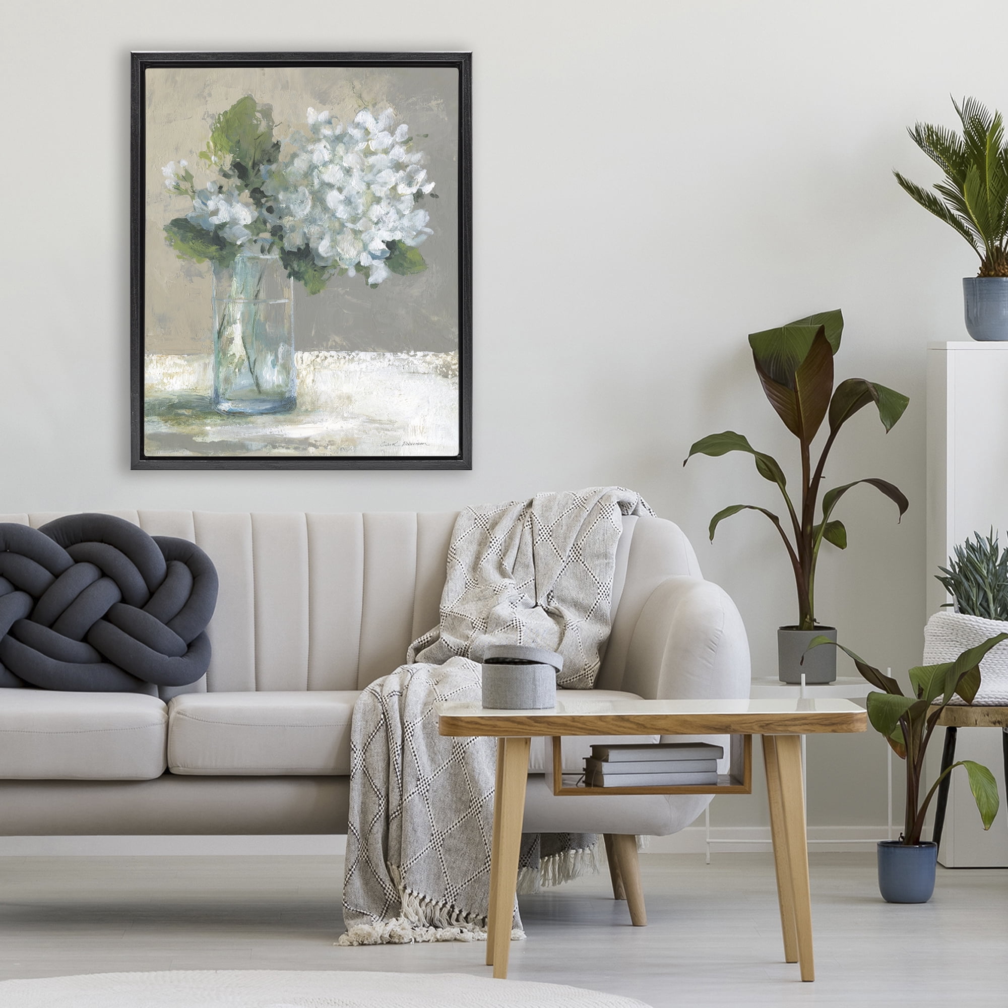Stupell Industries Serene White Hydrangeas in Glass Black Framed Floater Canvas Wall Art, design by Carol Robinson