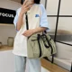 thumbnail image 5 of Gran oferta de bolsos de hombro sencillos de nailon de alta calidad con cremallera para jóvenes, bolsos de viaje para mujer, estilo básico de moda 2024, nuevos bolsos para mujer, 5 of 5