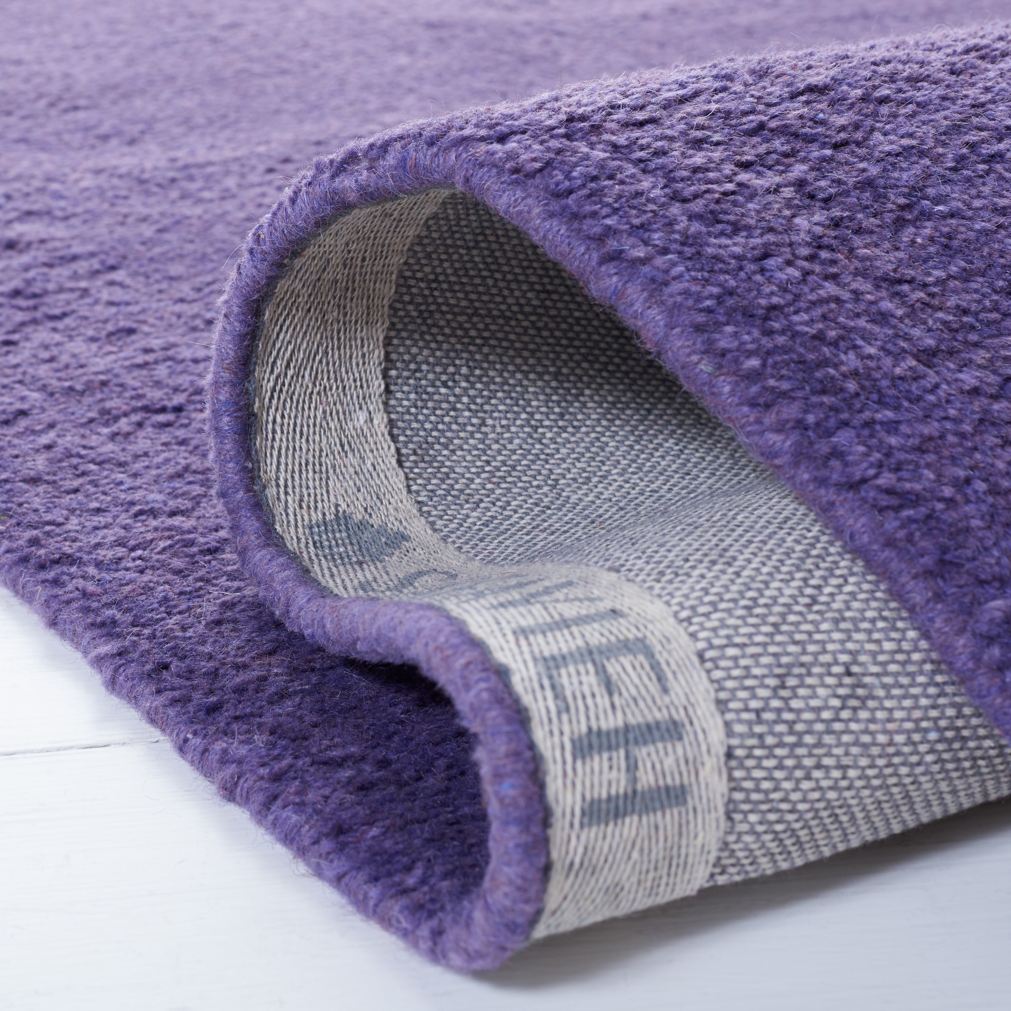 SAFAVIEH Himalaya Rachelle Solid Wool Area Rug, Purple, 4' x 4' Round
