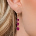thumbnail image 3 of Gem Stone King 18K Rose Gold Plated Silver Red Created Ruby 3 Stone Dangle Earrings for Women (5.40 Cttw, Gemstone July Birthstone, Oval 8X6MM, 7X5MM and 6X4MM), 3 of 6