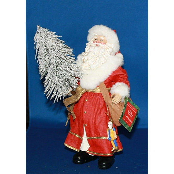 possible dreams clothtique a tree for the children features santa in a red outfit holding a christmas tree #805054