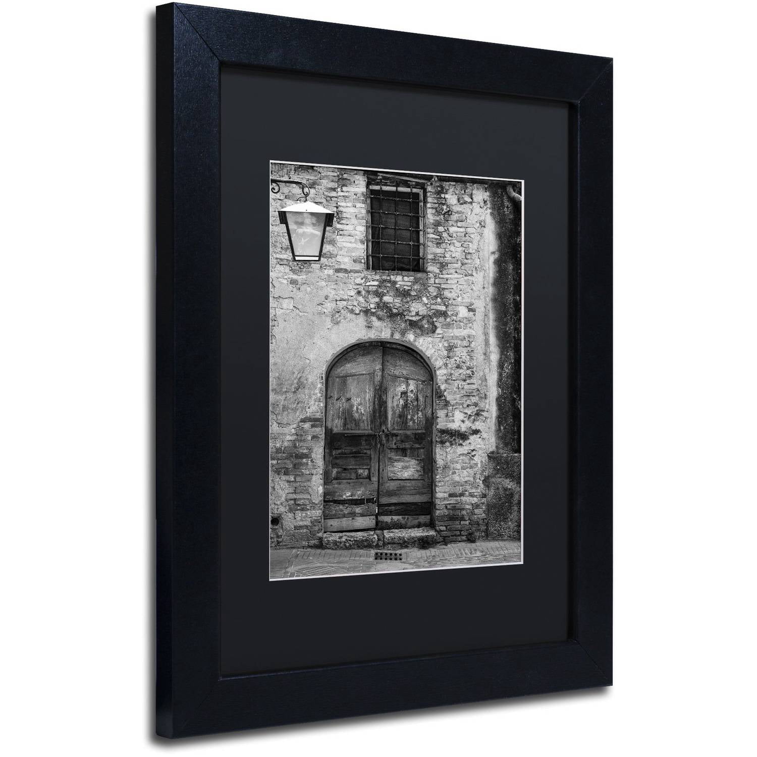 Trademark Fine Art "San Gimignano Door" Canvas Art by Moises Levy Black Matte, Black Frame