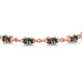 thumbnail image 2 of Gem Stone King 18K Rose Gold Plated Silver Green Mystic Topaz and White Moissanite Tennis Bracelet for Women (8.11 Cttw, Gemstone Birthstone, Oval 6X4MM, 7 inch), 2 of 5