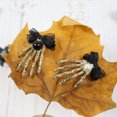 thumbnail image 4 of 2 paquetes de horquillas de garra de calavera de Halloween NQ con mini lazo negro, 4 of 5