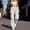 Beige, variant on Daolelai Women's Daily Casual Sports Multi-Pocket Elastic Waist Casual Pants Overalls Zipper Button Solid Color Trousers