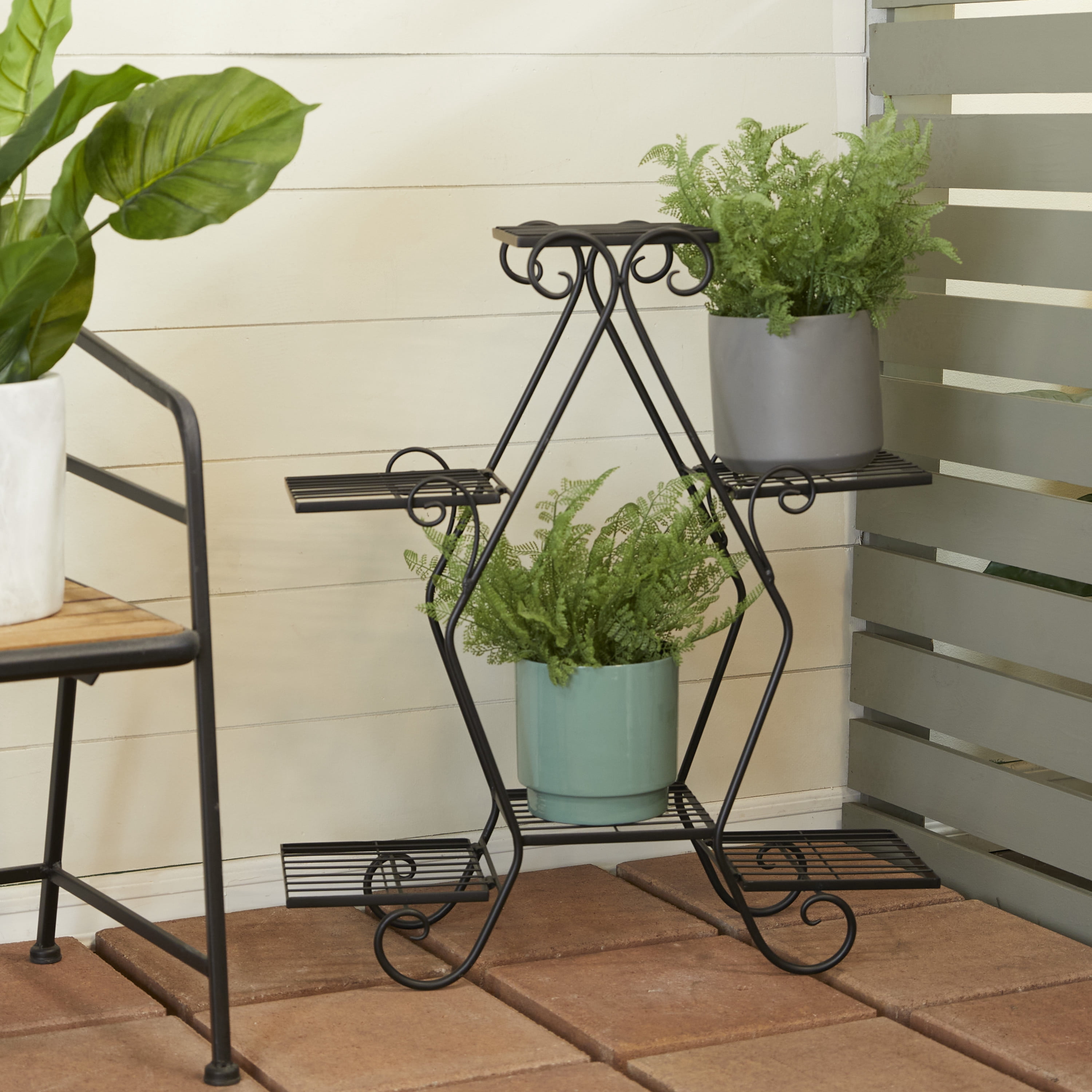 DecMode 27" x 10" x 31" 7 Tier Black Metal Scroll Plantstand
