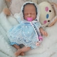 thumbnail image 5 of Muñeca pequeña de silicona Newtotlove de 7 cm con accesorios de alimentación, 5 of 5