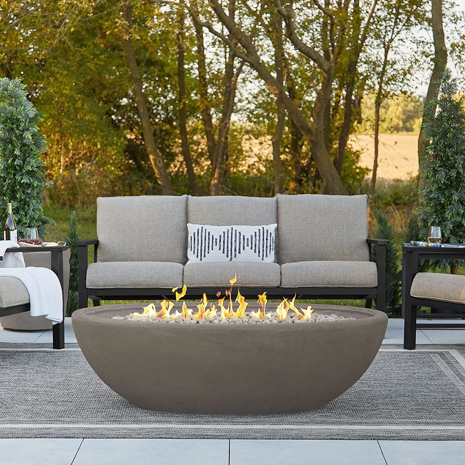 Real Flame Riverside 58" Oval Concrete Propane Fire Pit in Glacier Gray