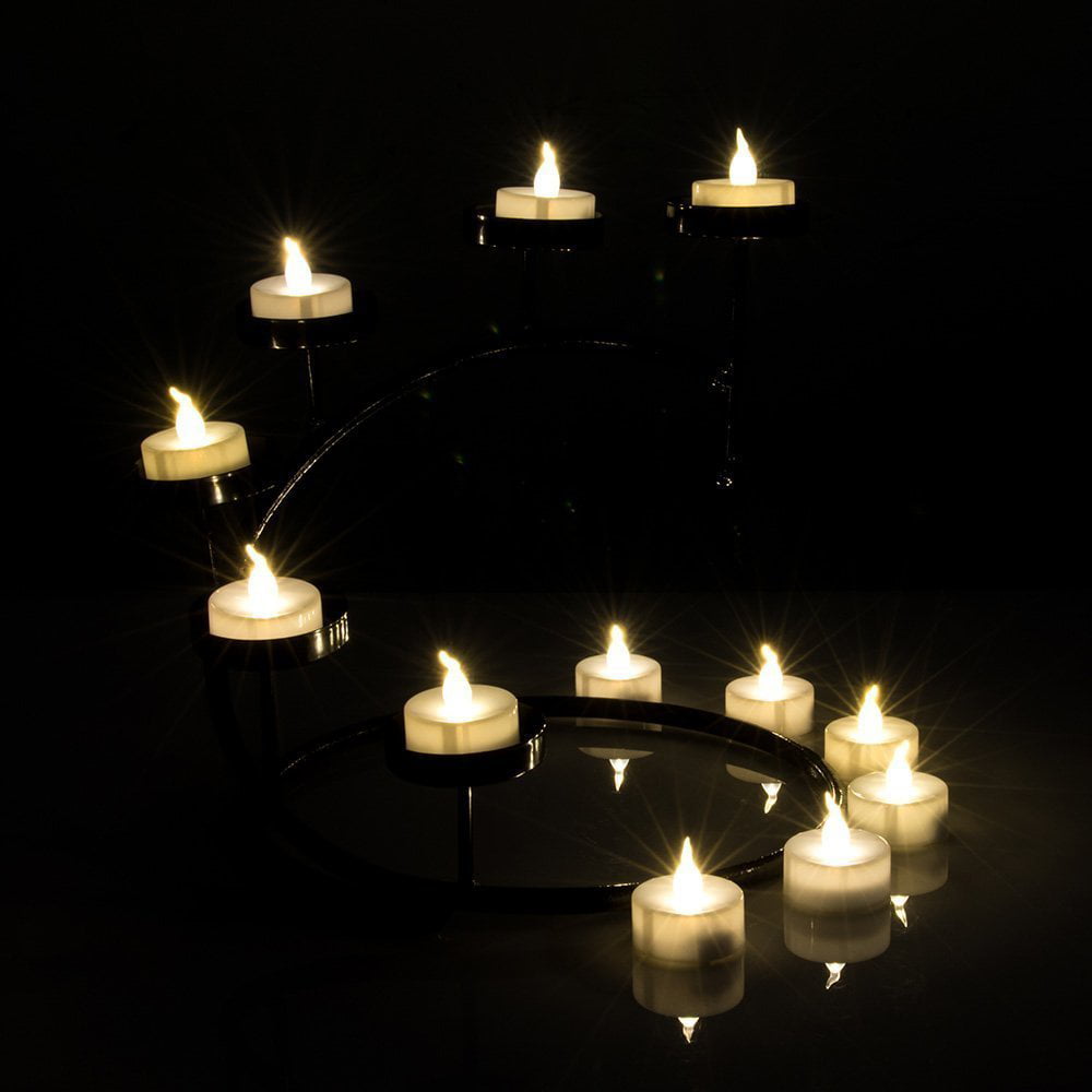 AGPtEK No flicker Flameless LED Tealights Candles Battery-Operated Long Lasting Tealights for Wedding Holiday Party Home Decoration 24pcs Warm White 