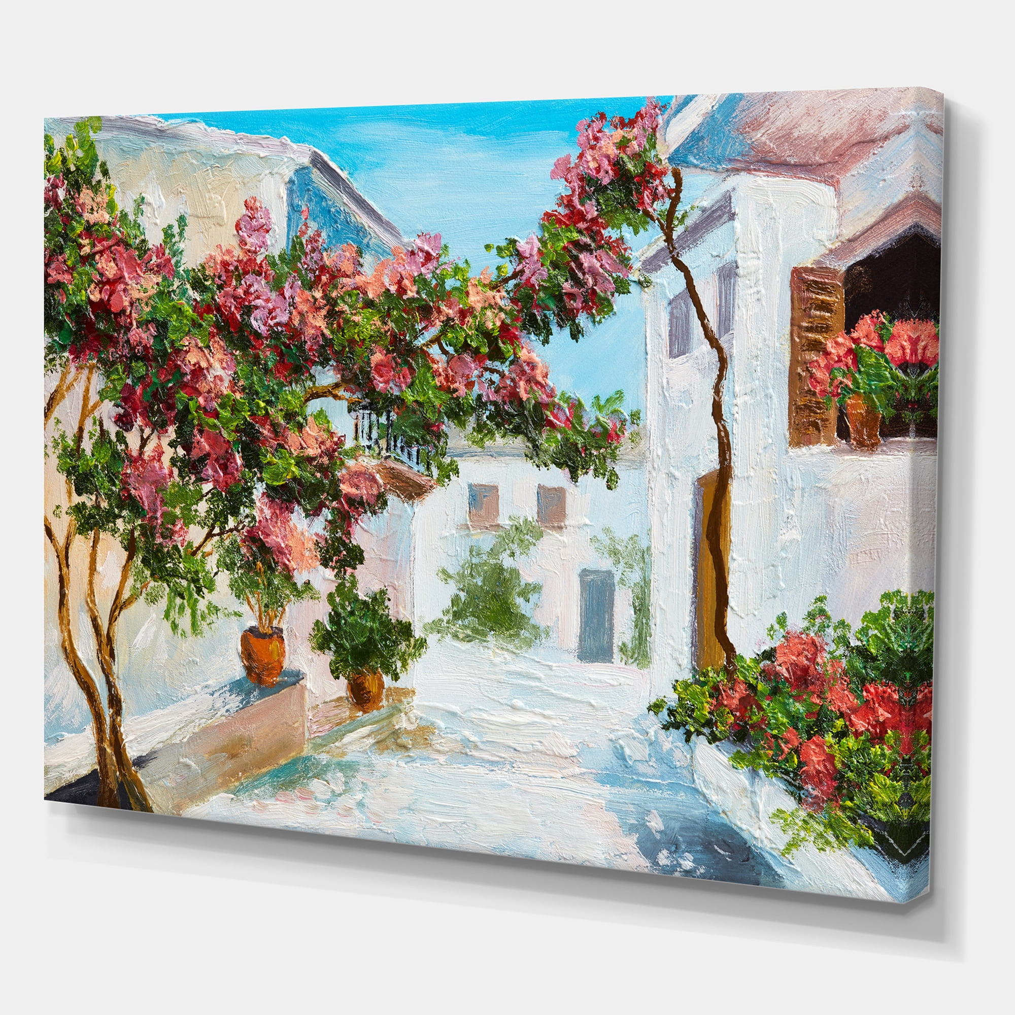 Designart ' Blossoming Flowers With White House Near The Sea ' Nautical & Coastal Canvas Wall Art Print
