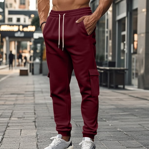 Pantalones largos para hombre, casuales, de moda, de color sólido, con cordón, cintura elástica y bolsillos.
