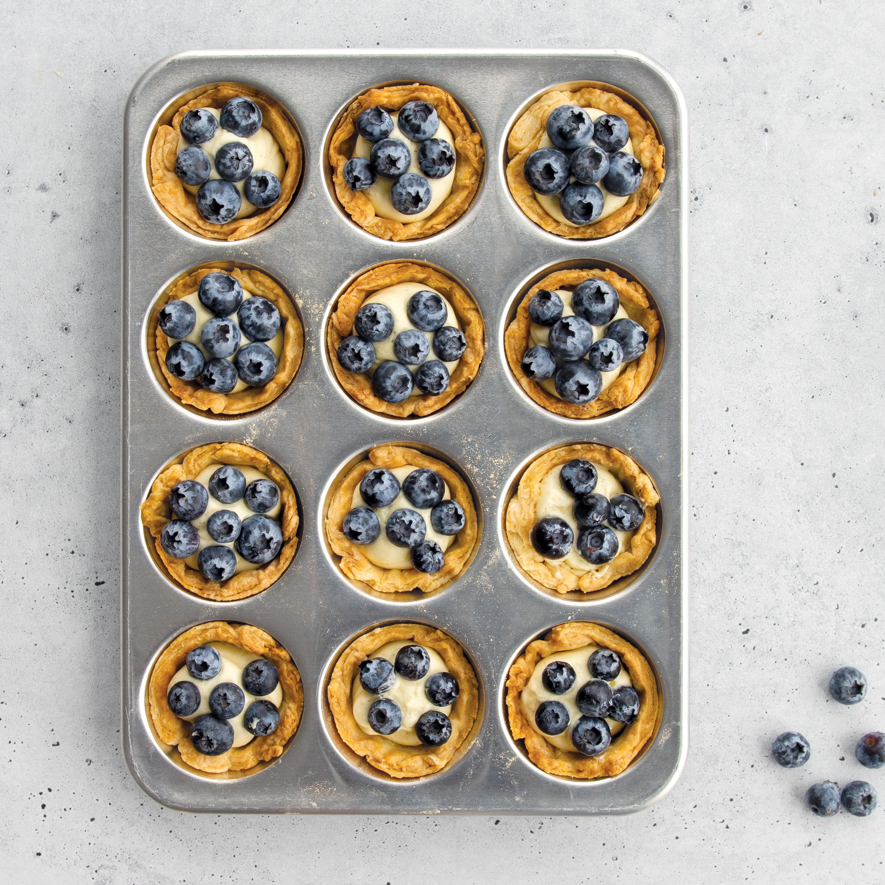 Nordic Ware Natural Aluminum 12 Cavity Muffin Pan with High Dome Lid