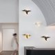 thumbnail image 1 of Lámpara de pared LED con forma de pájaro y espejo cruzado, sencilla y creativa, para escritorio, lámpara de ambiente de modelado de pared, lámpara de pared para sala de estar, dormitorio y mesita de, 1 of 5