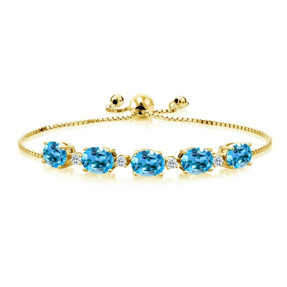 Gem Stone King 18K Yellow Gold Plated Silver Oval Swiss Blue Topaz and White Topaz Tennis Bracelet for Women (7.84 Cttw, Gemstone Birthstone, Fully Adjustable up to 9 inch)