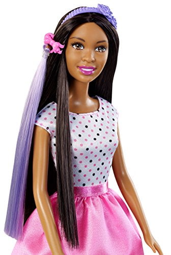 barbie doll with hair accessory