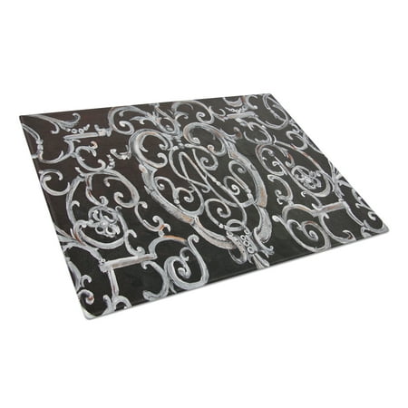 

Caroline s Treasures Ironwork Fence Glass Cutting Board Large