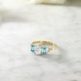 thumbnail image 4 of Gem Stone King 10K Yellow Gold 3-Stone 3-Stone Diamond Engagement Ring Set with Blue Zircon and Near Colorless (GH) Oval 2.22cttw Moissanite (Size 8), 4 of 4