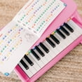 thumbnail image 5 of Melissa & Doug Learn-to-Play Pink Piano With 25 Keys and Color-Coded Songbook, 5 of 10