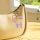 thumbnail image 4 of pstuiky Llavero con inicial para mujer, con borla morada. Lindo llavero de coche para cartera, mochila o bolso., 4 of 4