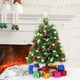 thumbnail image 5 of Árbol de Navidad artificial con bayas rojas, ideal para decorar el jardín o el patio. Perfecto como regalo de Navidad. Incluye una planta de bayas rojas, un soporte metálico y es ideal para, 5 of 6