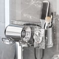 thumbnail image 4 of Secador de pelo montado en la pared, sin instalación de taladro • Organizador multifuncional para el baño que ahorra espacio • Soporte de plástico engrosado • Cubo de almacenamiento y ganchos •, 4 of 6